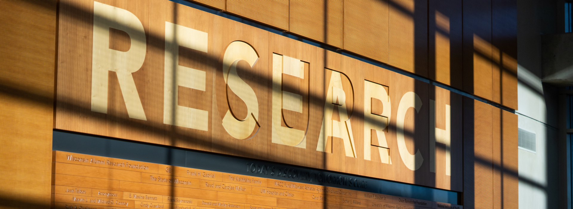 Photo of the research wall at the Wisconsin Institutes for Medical Research