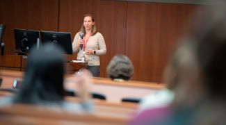 Dr. Michelle Kimple speaks to an audience.