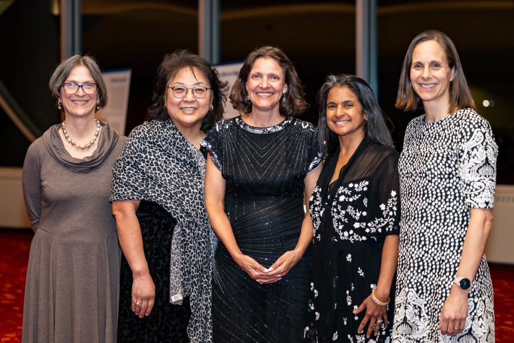 Dr. Wetterneck, center, celebrates with her General Internal Medicine faculty colleagues (left to right) Elizabeth Trowbridge, MD, Kenneth D. Skaar, MD, Chair of Primary Care and chief; Mary Pak, MD, clinical professor; Shobhina Chheda, MD, MPH, professor; and Kathryn Miller, MD, associate professor