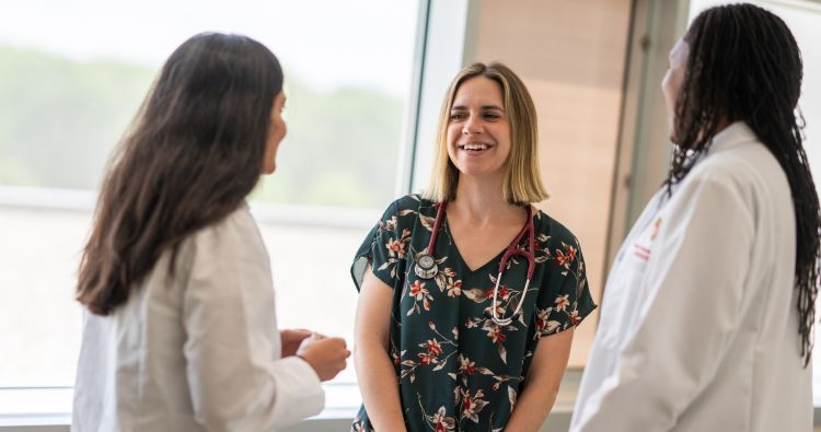 Dr. Nadia Sweet with Rheumatology faculty Shivani Garg, MD, MS, assistant professor, and Sancia Ferguson, MD, MPH, assistant professor.