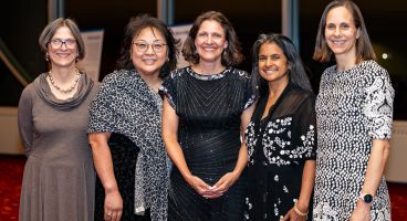 Dr. Wetterneck, center, celebrates with her General Internal Medicine faculty colleagues (left to right) Elizabeth Trowbridge, MD, Kenneth D. Skaar, MD, Chair of Primary Care and chief; Mary Pak, MD, clinical professor; Shobhina Chheda, MD, MPH, professor; and Kathryn Miller, MD, associate professor