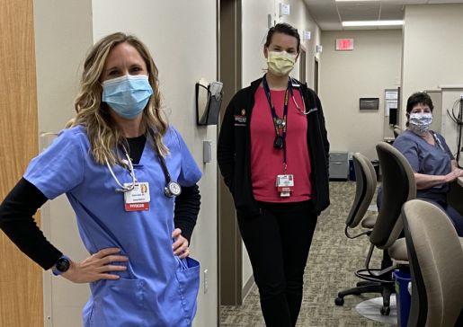 Briana Jelenc, MD, clinical assistant professor, General Internal Medicine, in the clinic with internal medicine resident Johanna Poterala, MD, and medical assistant Kathy Coppens.